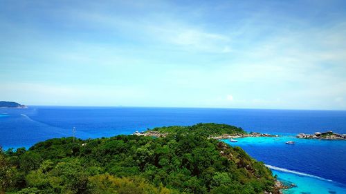 Scenic view of sea against blue sky