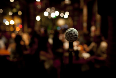 Close-up of microphone at concert