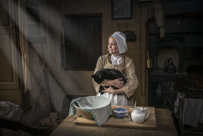 Young couple sitting on table