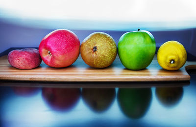 A set of fresh and natural vitamins. a number of useful fruits on a cutting board