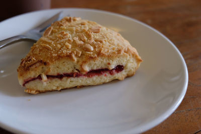 Close-up of bread in plate on table