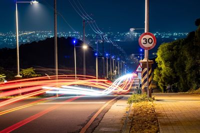 Light trails on road at night