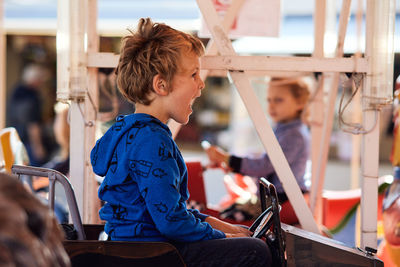 Rear view of people sitting in bus