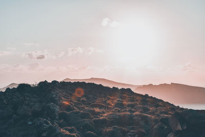 Scenic view of mountains against sky during sunset