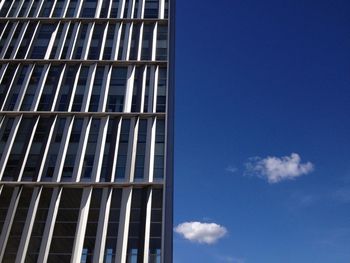 Low angle view of building against blue sky