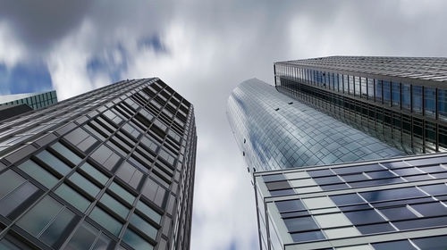 Low angle view of modern buildings against sky