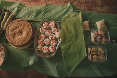 High angle view of baked food on green leaves