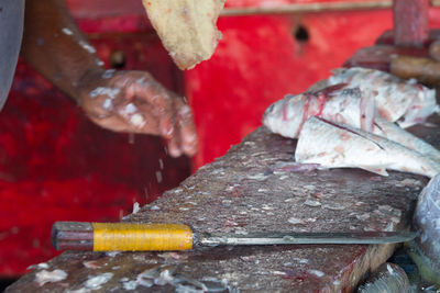 Close-up of hand preparing food