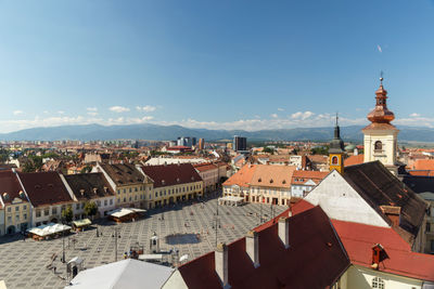 Aerial view of townscape against sky