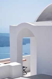 Built structure by sea at santorini