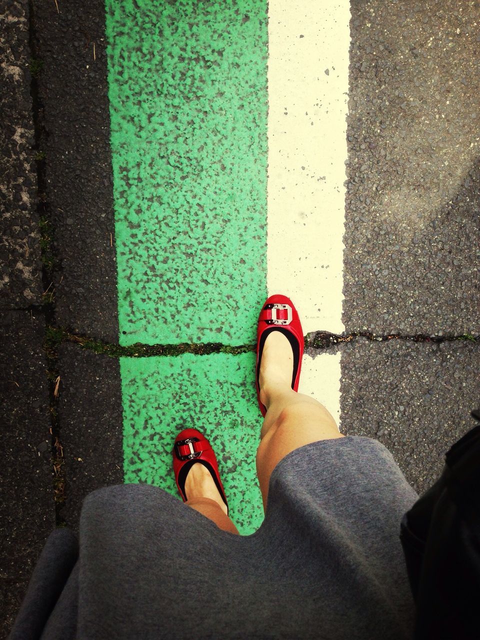 low section, person, shoe, personal perspective, standing, lifestyles, street, high angle view, human foot, footwear, leisure activity, day, road, outdoors, men, directly above