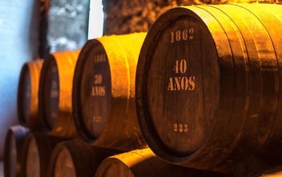 Close-up of wine barrels in cellar