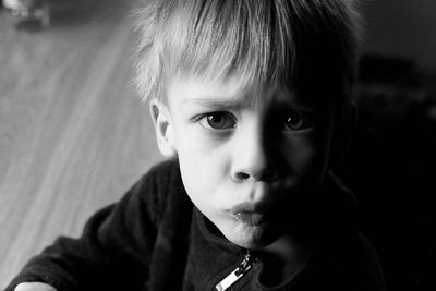 Portrait of blond child looking at camera