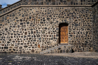 Stone wall of old building