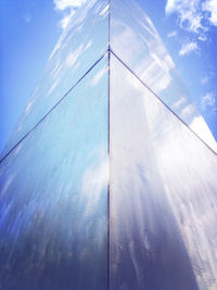 Low angle view of built structure against blue sky