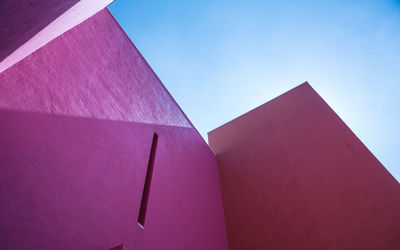 Low angle view of built structure against blue sky