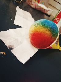 High angle view of multi colored candies on table