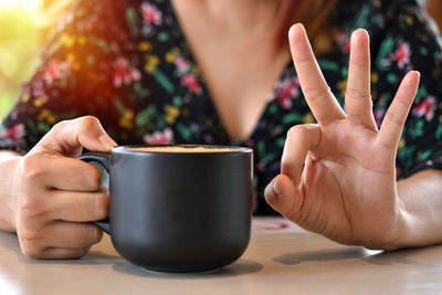Close-up of coffee cup on table