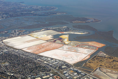 High angle view of city by sea