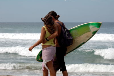 People enjoying at beach