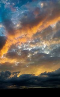 Scenic view of dramatic sky during sunset