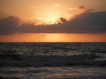 Scenic view of sea against sky during sunset