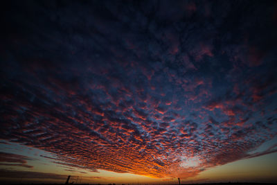 Low angle view of dramatic sky during sunset