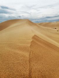 Scenic view of desert against sky