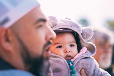 Portrait of father and baby son together