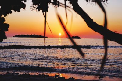Scenic view of sea at sunset
