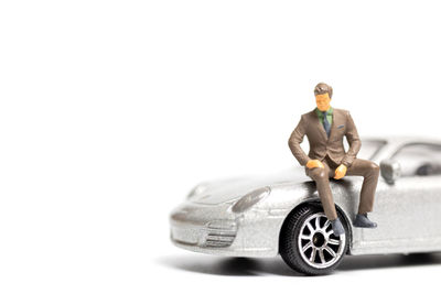 Close-up of toy car against white background