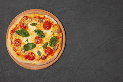 High angle view of pizza on table