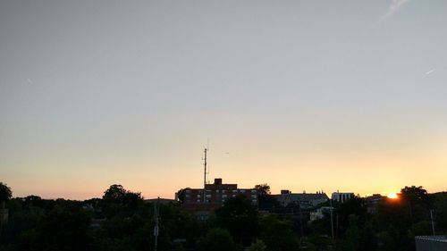 Built structure against clear sky at sunset