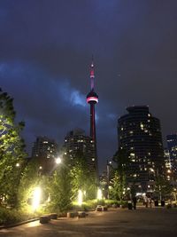 Low angle view of communications tower at night