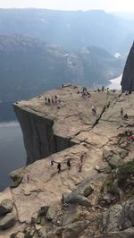 High angle view of people on rock formation