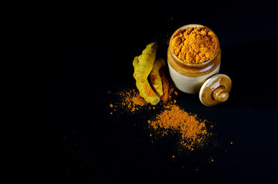 High angle view of coffee on table against black background