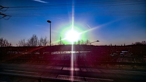 Street light against sky