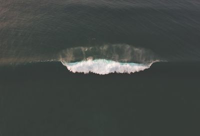 Scenic view of sea against sky at night