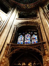 Low angle view of ornate window in historic building