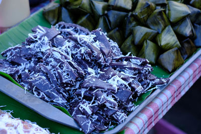 High angle view of chopped vegetables and leaves in market