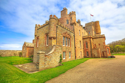 Low angle view of historical building against sky