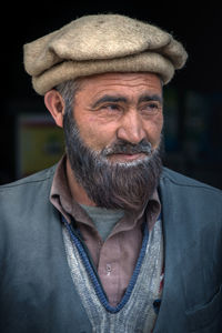 Portrait of smiling man wearing hat