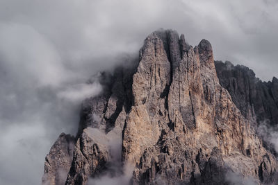 View of rocky mountains against sky