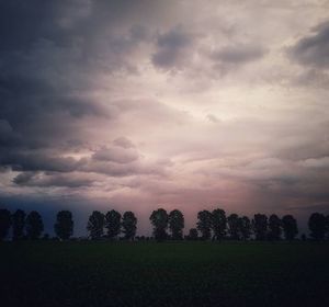 Scenic view of landscape against cloudy sky