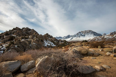 Scenic view of snowcapped mountains against sky