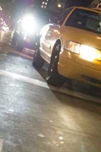 Cars on road at night
