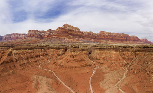 Aerial panoramas of the towering vermilion cliffs of the paria p