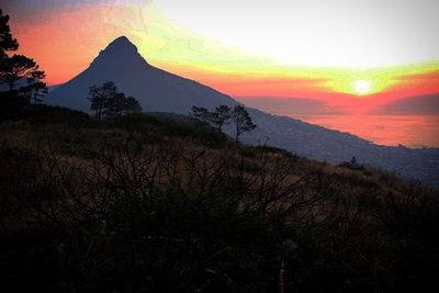 Scenic view of mountains at sunset