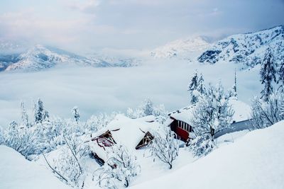 Scenic view of snow mountains against sky