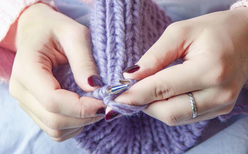 Close-up of woman holding hands